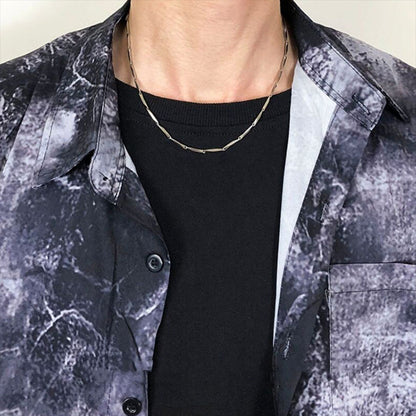 Collana croce diamante titanio