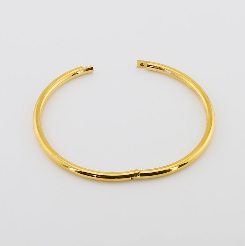 Braccialetto Titanio Oro