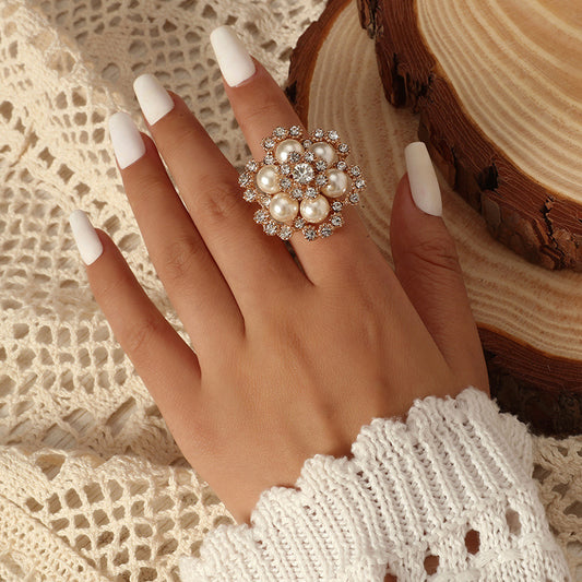 Anello fiore perle strass