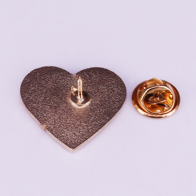 Spilla cuore glitter distintivo