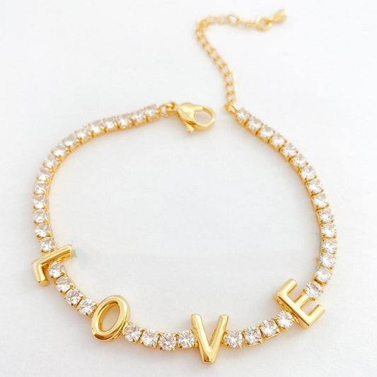 Braccialetto con charms cuore croce