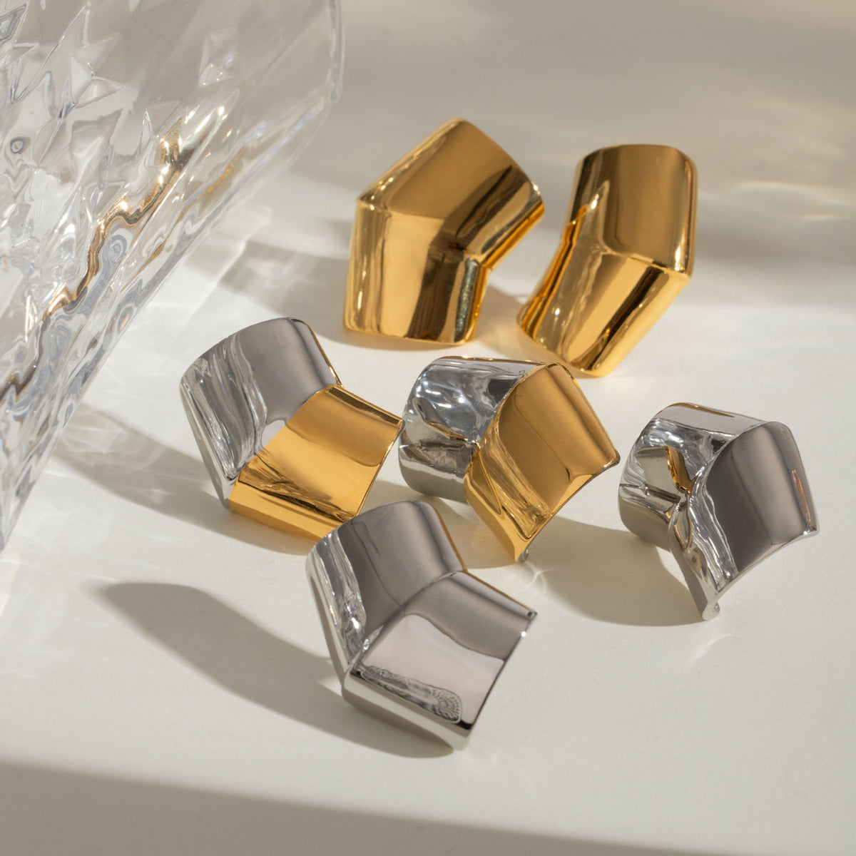 Orecchini geometrici oro acciaio