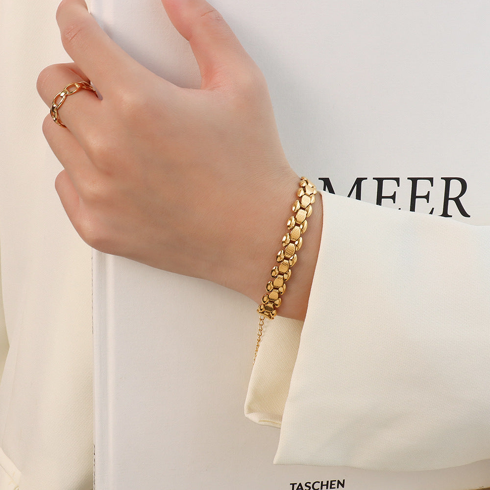 Bracciale titanio oro 18K
