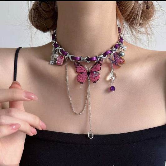 Collana farfalla viola con nappa