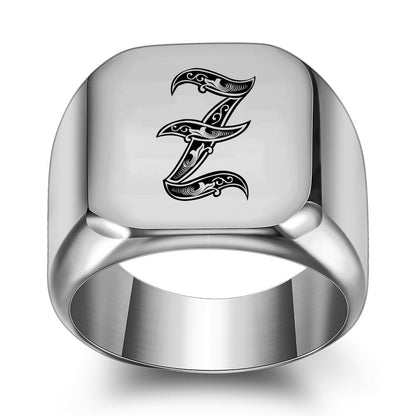 Anello con iniziale in titanio
