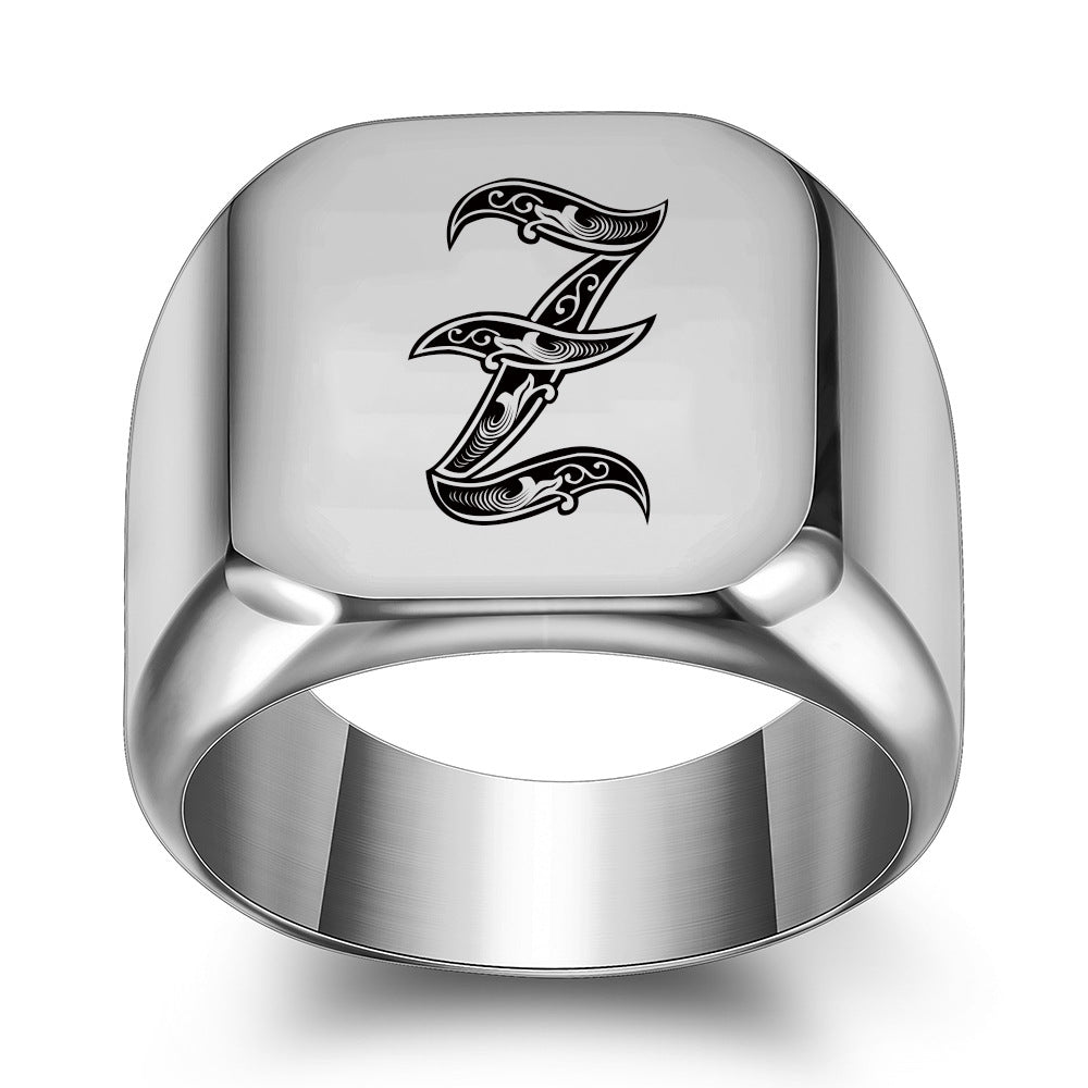 Anello con iniziale in titanio