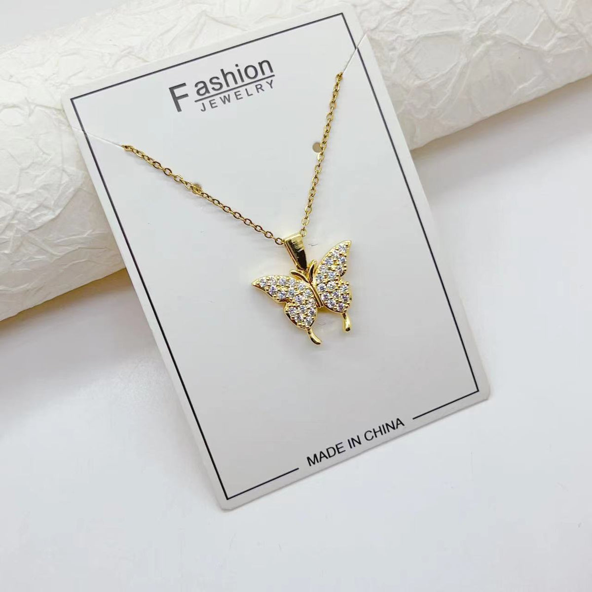 Collana acciaio titanio cuore farfalla girasole