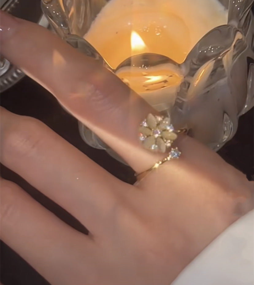 Anello fiore opale rotante