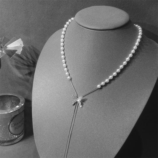 Collana perle farfalla