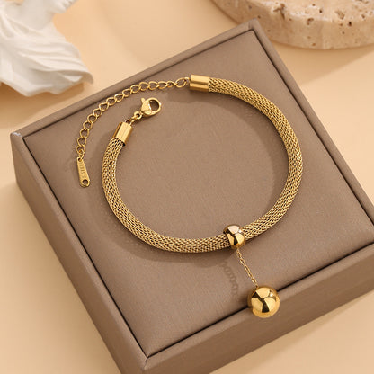Collana sfere dorate con nappa