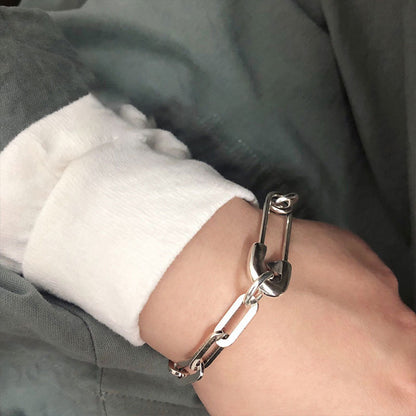 Bracciale geometrico con spilla