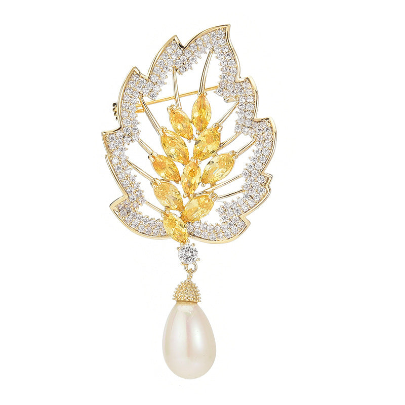 Spilla foglia perle con zirconi