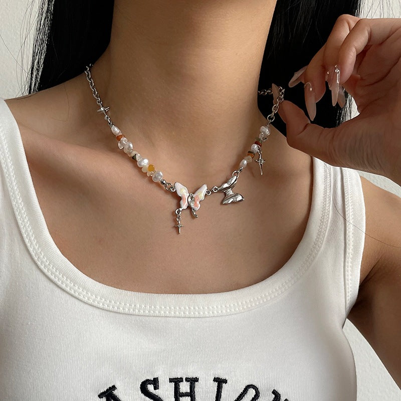Collana farfalla ricamata