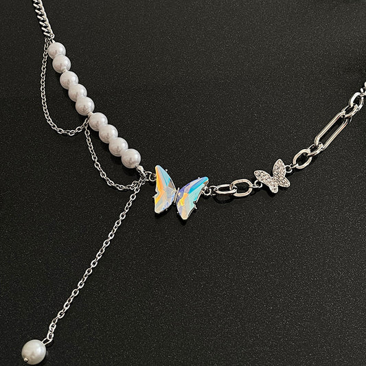 Collana farfalla con nappina diamante