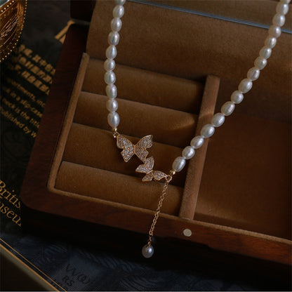 Collana farfalla con perla vintage