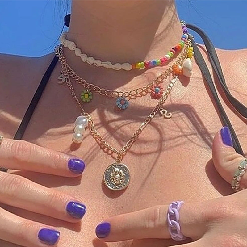 Collana fiori e conchiglie