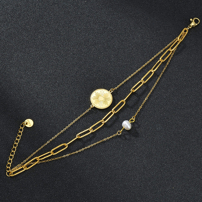 Braccialetto perla titanio