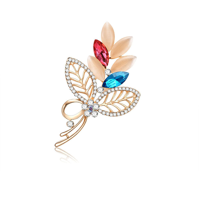 Spilla foglia traforata diamanti