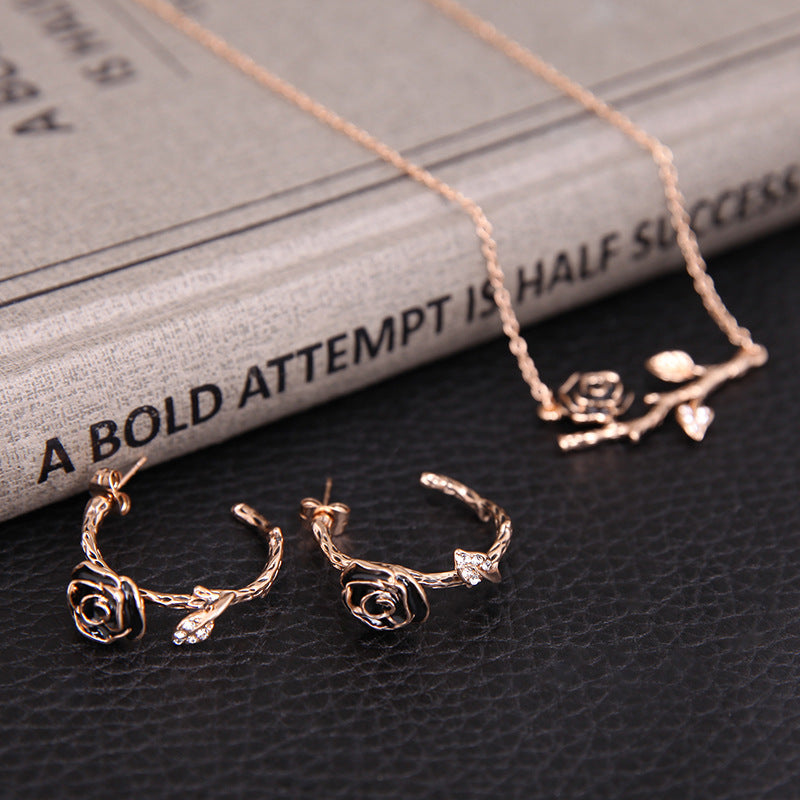 Set collana orecchini rami in fiore