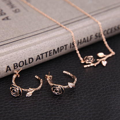 Set collana orecchini rami in fiore
