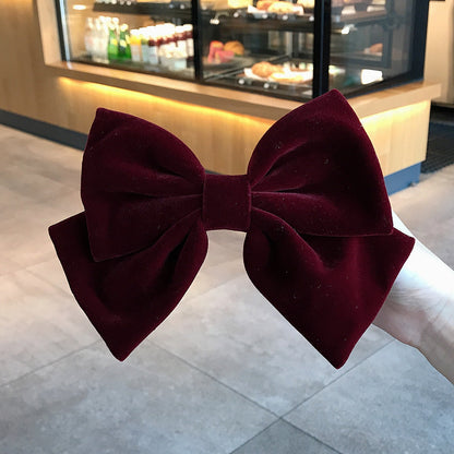 Spillone fiocco velluto rosso
