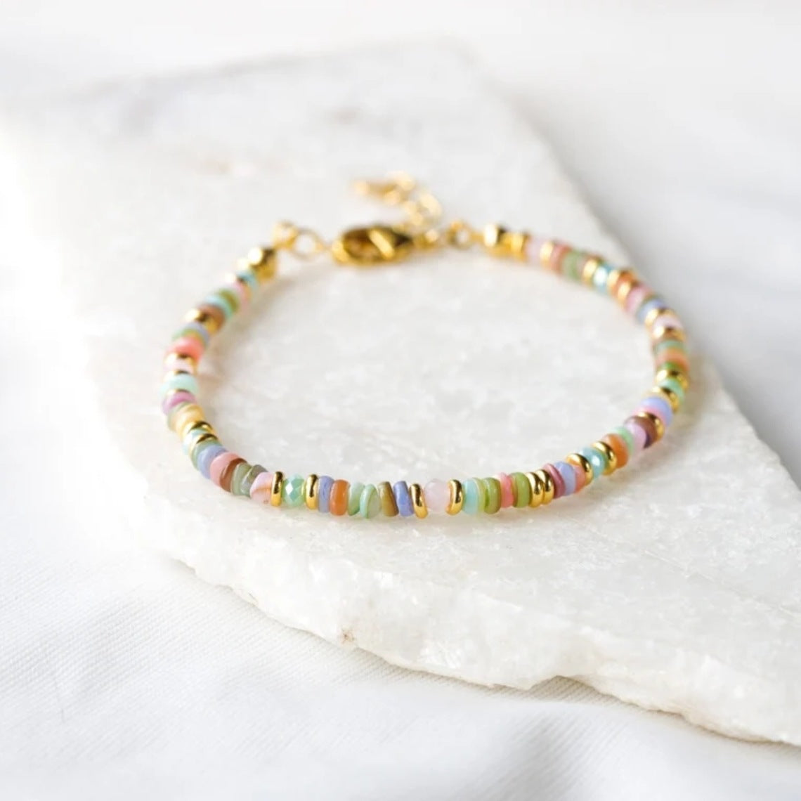 Bracciale conchiglia tessuto