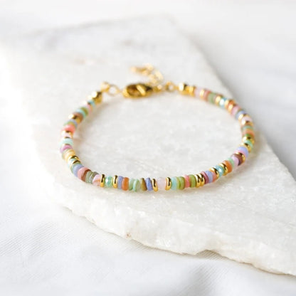 Bracciale conchiglia tessuto