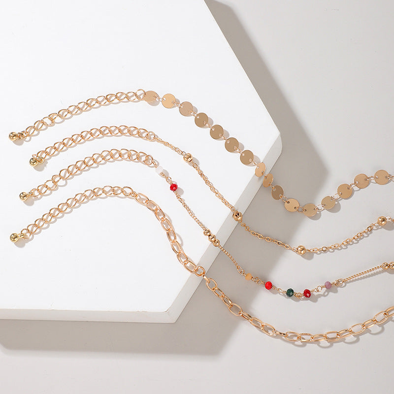 Cavigliera perline colorate set di 4