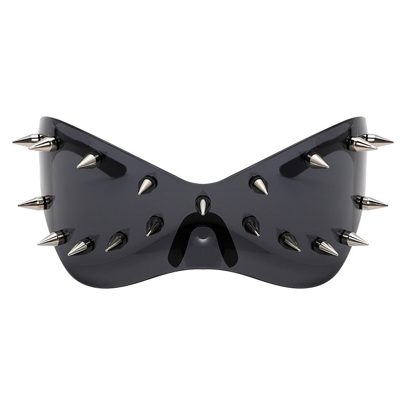 Occhiali oversize rivetti