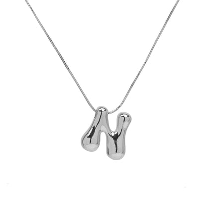 Collana lettera in ottone