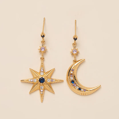 Orecchini stella e luna asimmetrici con zirconi