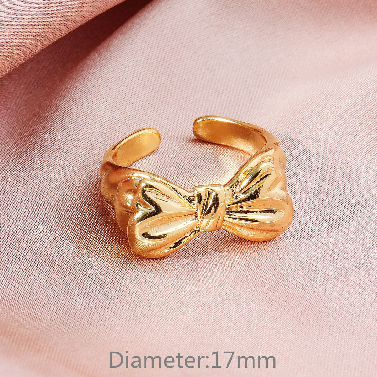Anello fiocco aperto placcato oro