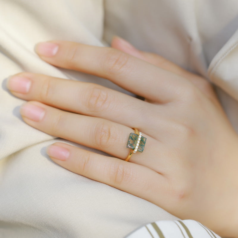 Anello muschio verde argento