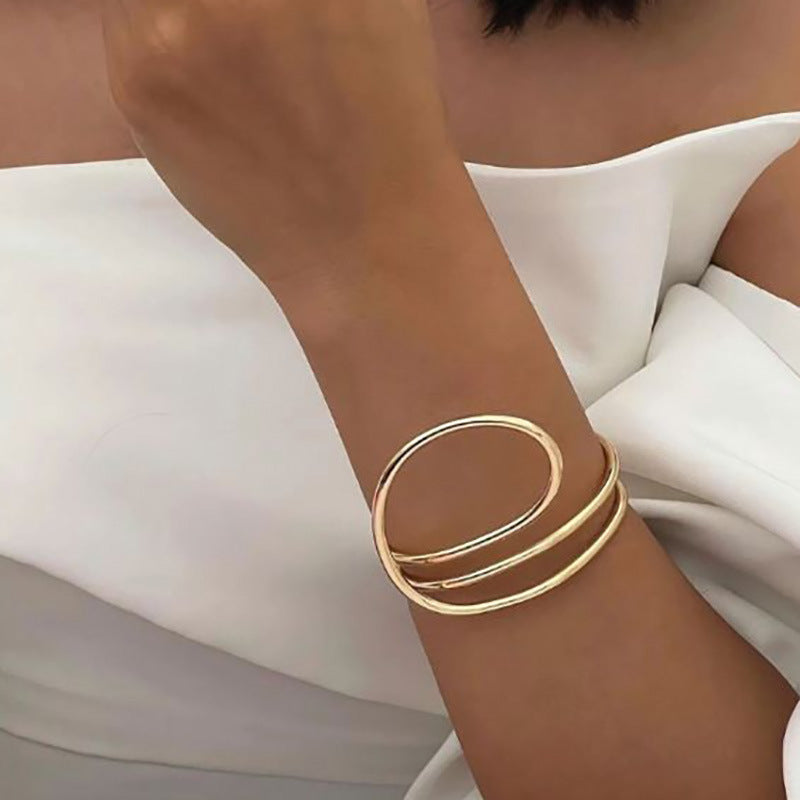 Bracciale geometrico regolabile