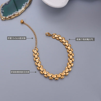 Bracciale titanio oro 18K