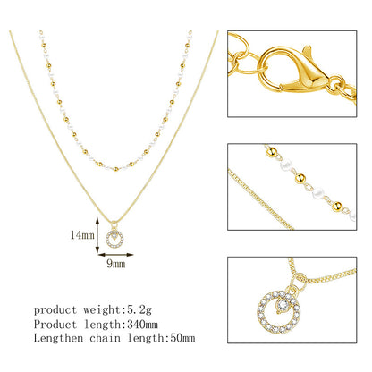 Collana anello doppia perla