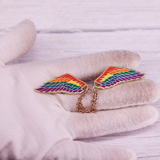 Spilla ali arcobaleno