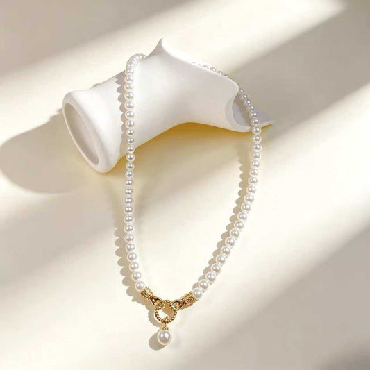 Collana perle e camelie