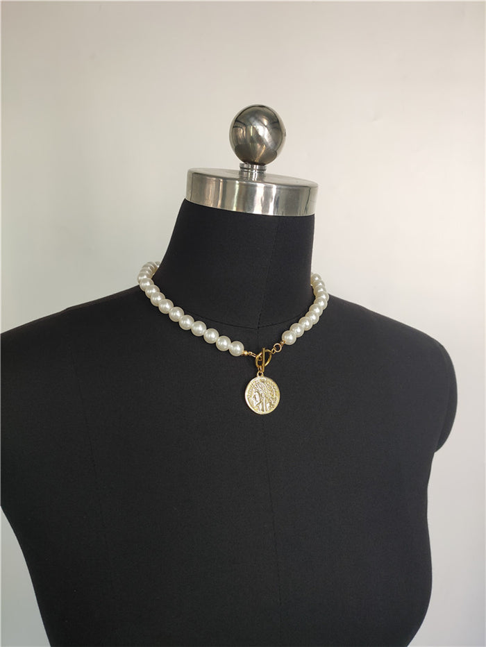 Collana moneta e perle con ciondolo