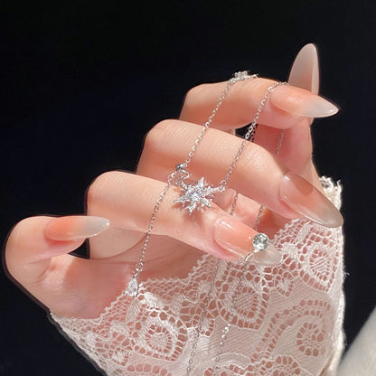 Collana fiocco di neve con nappa