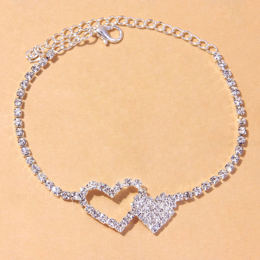 Cavigliera doppio cuore strass