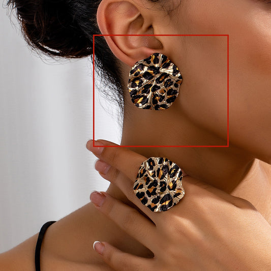 Orecchini disco leopardato