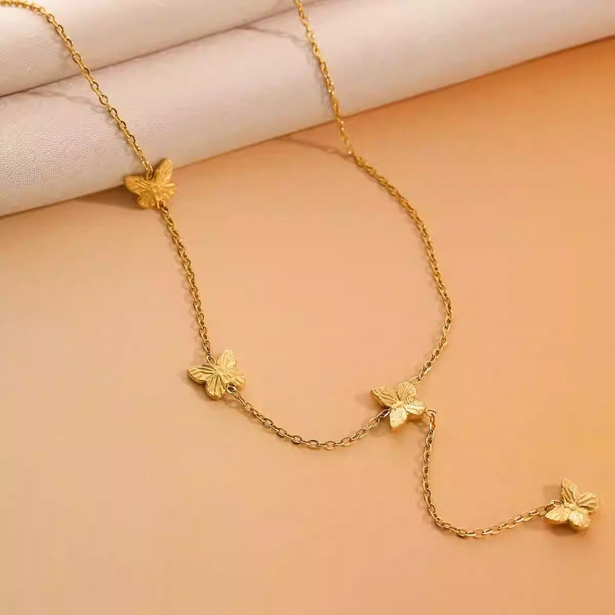 Collana farfalla 3D acciaio titanio