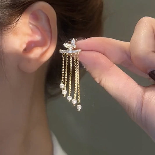 Clip orecchio farfalla con nappina in zircone