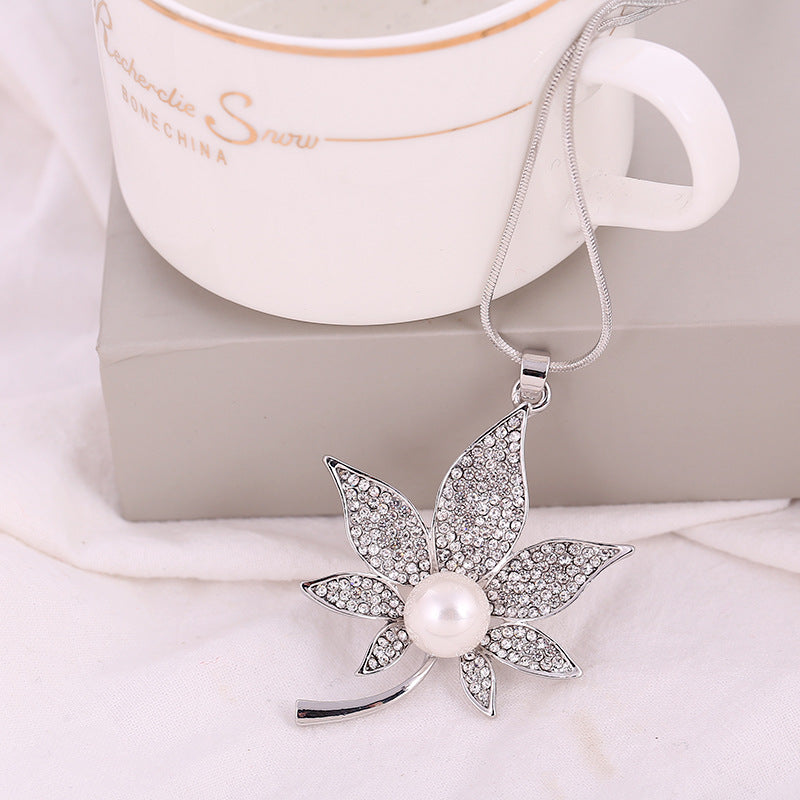 Collana foglie diamanti