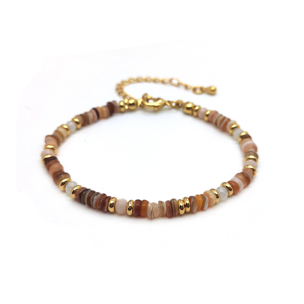Bracciale conchiglia tessuto