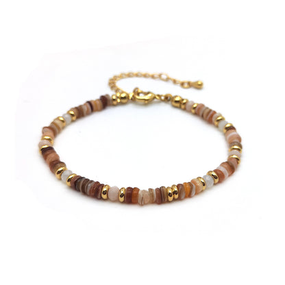 Bracciale conchiglia tessuto