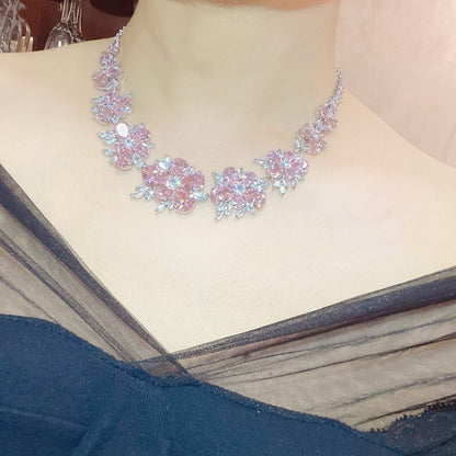 Set gioielli fiore con diamanti