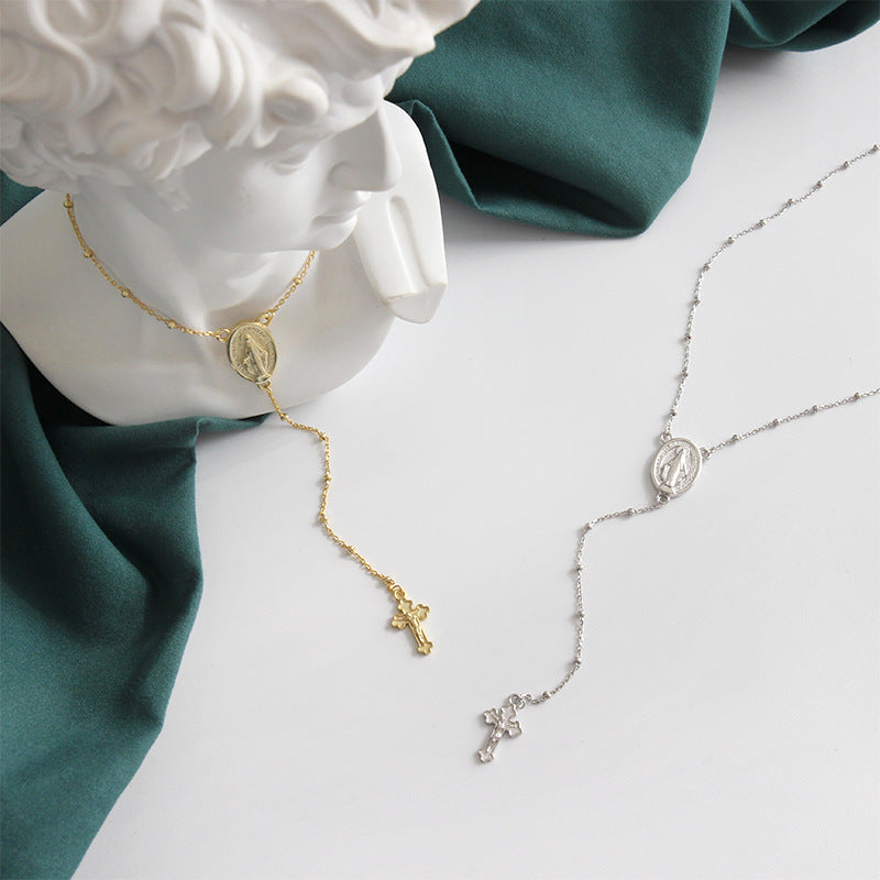 Collana moneta e perle rotonda