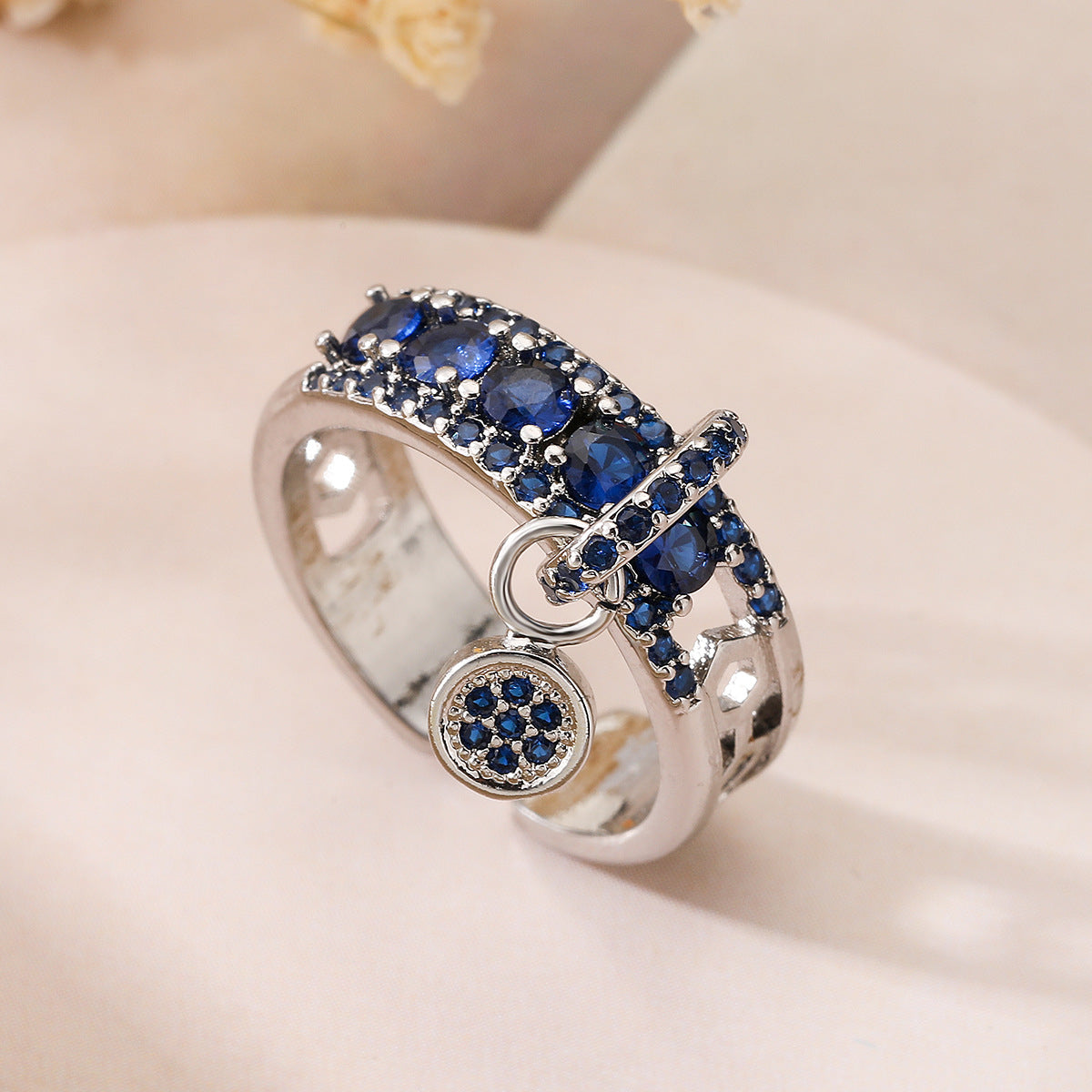 Anello geometrico aperto con zircone